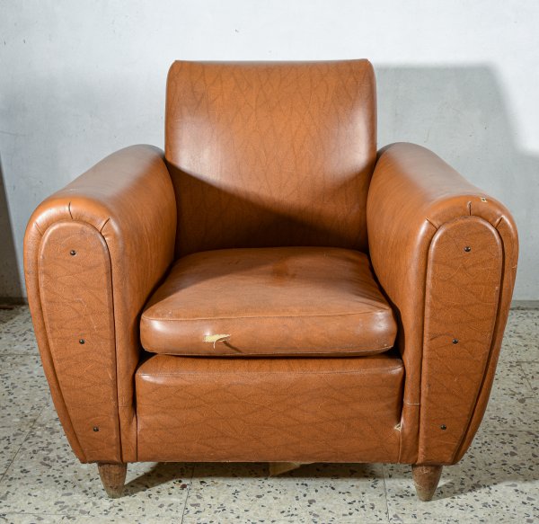 Poltrona in pelle marrone da sistemare Italia 1970