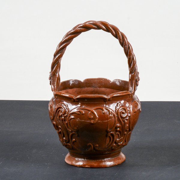 vaso smaltato in terracotta con manico intrecciato