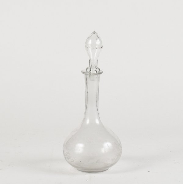 Bottiglia in vetro ampolla con decoro floreale inciso XX secolo